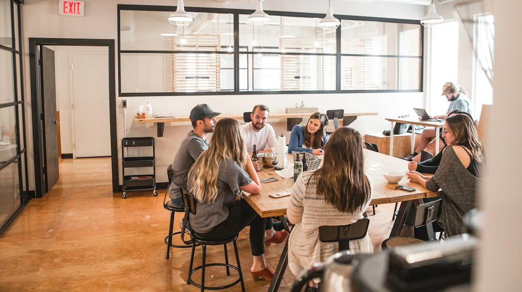 team meeting healthy employees